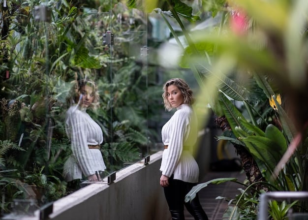 A visually appealing image showcasing a sustainable business practice, such as a rooftop garden on a commercial building, a solar panel installation, or a zero-waste packaging solution. The image should highlight the positive environmental impact of sustainable entrepreneurship.