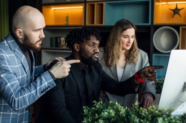 A diverse group of people brainstorming in a modern co-working space, illustrating the importance of collaboration and networking in entrepreneurial ecosystems.