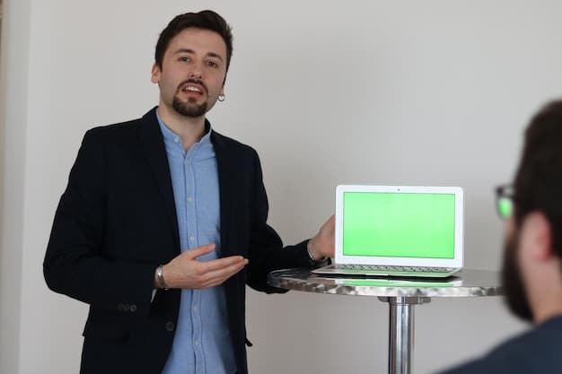 A sales representative giving a product demonstration via video conference. The representative is smiling and pointing to a key feature on the screen. The prospect on the other end of the video call appears engaged and interested.