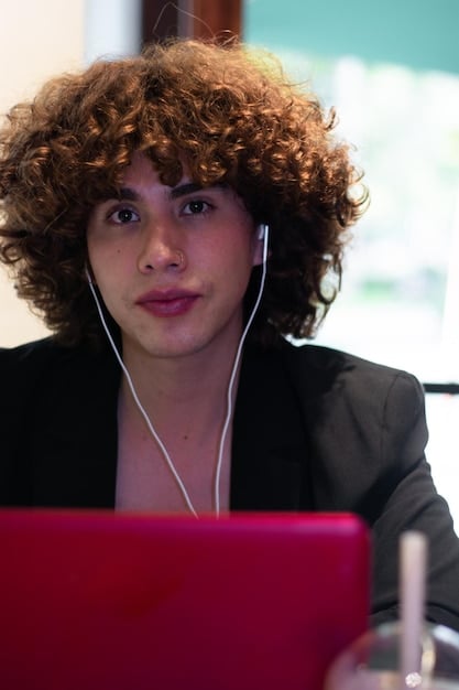 A close-up shot of a sales representative on a video call, actively listening and taking notes, displaying attentive engagement and focused lead qualification.