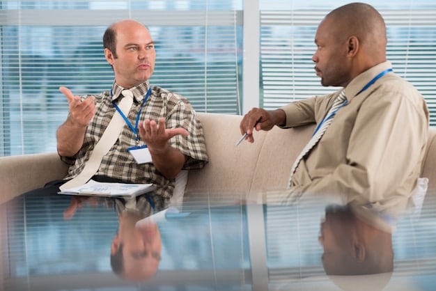 A sales professional actively listening to a client during a meeting, demonstrating empathy and understanding through body language and eye contact. The scene conveys a sense of trust and collaboration.